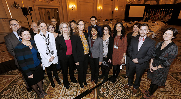 CICS employees and other logistics staff with conference delegates at the Meeting of the Canadian Council of Tourism Ministers (Photo: John Woods, Canadian Press Images)